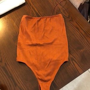 Burnt orange bodysuit
